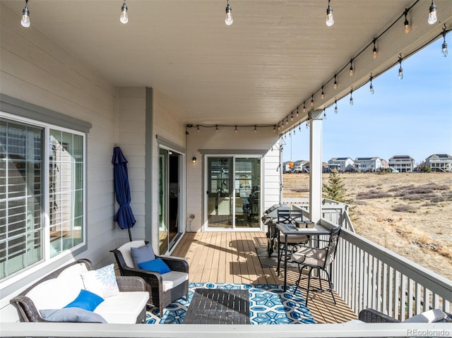 wooden deck featuring an outdoor living space