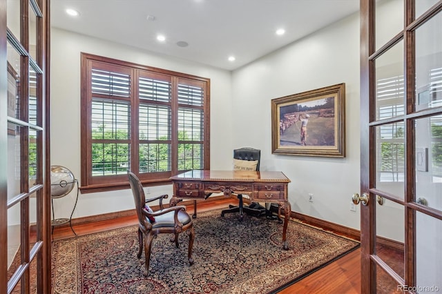 8717 Ridgepoint Dr, Castle Pines, CO 80108 - office space with plenty of natural light, wood finished floors, recessed lighting, and french doors