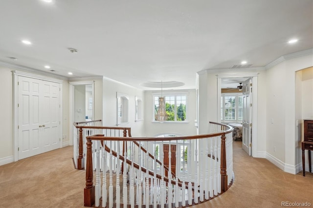 8717 Ridgepoint Dr, Castle Pines, CO 80108 - corridor featuring an upstairs landing, light colored carpet, ornamental molding, and recessed lighting