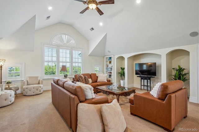 8717 Ridgepoint Dr, Castle Pines, CO 80108 - living area featuring high vaulted ceiling, ceiling fan, light carpet, built in shelves, and recessed lighting