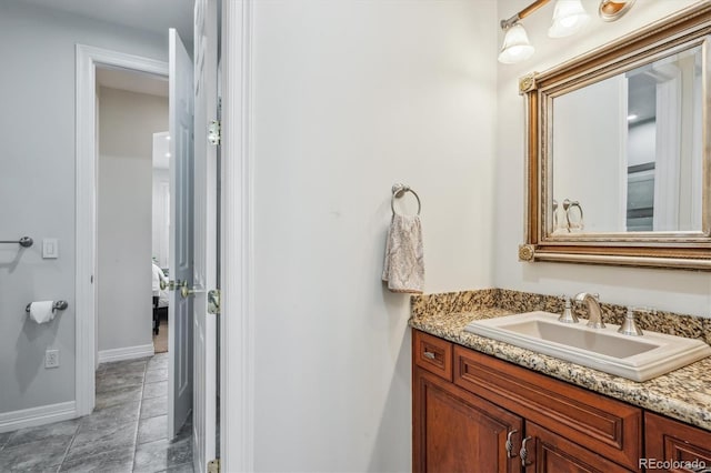 8717 Ridgepoint Dr, Castle Pines, CO 80108 - bathroom with vanity and baseboards