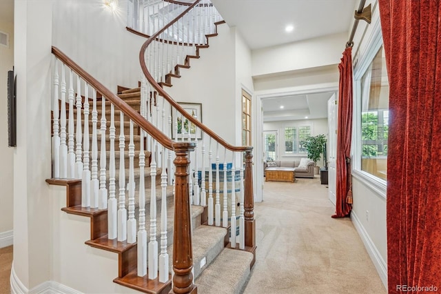 8717 Ridgepoint Dr, Castle Pines, CO 80108 - stairway featuring carpet and recessed lighting