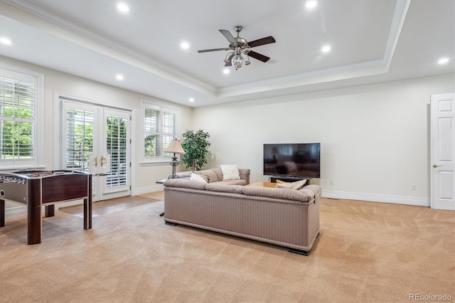 8717 Ridgepoint Dr, Castle Pines, CO 80108 - living area with ornamental molding, light carpet, a tray ceiling, recessed lighting, and ceiling fan