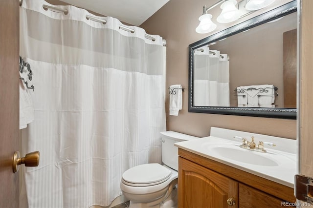 1799 S Lee St Unit B, Lakewood, CO 80232 - bathroom with toilet, vanity, and curtained shower