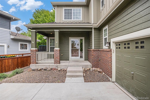 3389 Willowrun Dr, Castle Rock, CO 80109 - doorway to property featuring a porch, board and batten siding, and brick siding