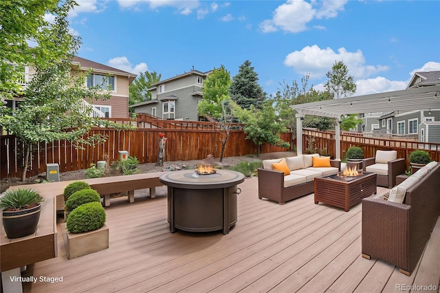 3389 Willowrun Dr, Castle Rock, CO 80109 - wooden terrace featuring an outdoor living space with a fire pit, a fenced backyard, and a residential view
