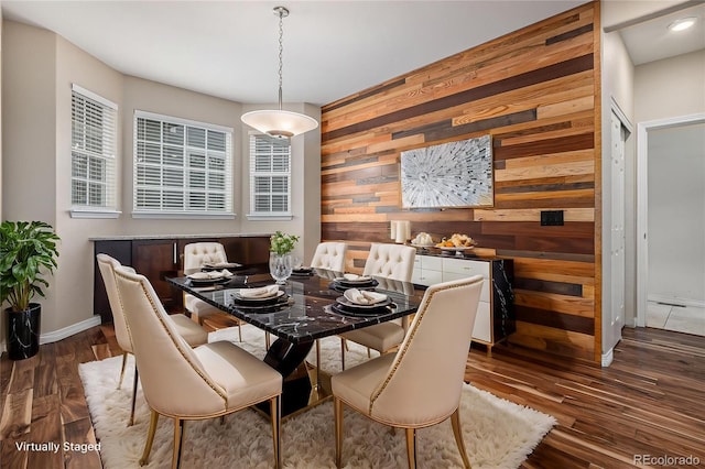 3389 Willowrun Dr, Castle Rock, CO 80109 - dining space featuring wood walls, dark wood-style floors, baseboards, and recessed lighting