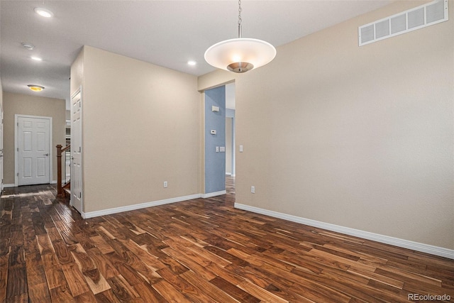 3389 Willowrun Dr, Castle Rock, CO 80109 - empty room with dark wood finished floors, baseboards, recessed lighting, and a smoke detector