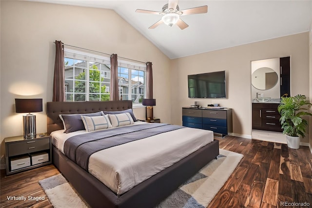 3389 Willowrun Dr, Castle Rock, CO 80109 - bedroom with dark wood finished floors, lofted ceiling, a ceiling fan, ensuite bath, and baseboards