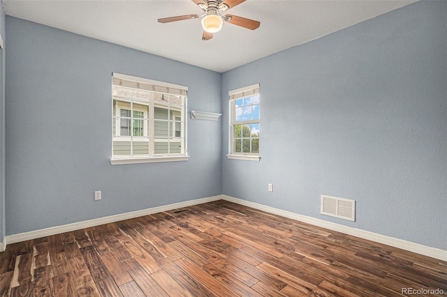 3389 Willowrun Dr, Castle Rock, CO 80109 - unfurnished room featuring dark wood-type flooring, ceiling fan, and baseboards
