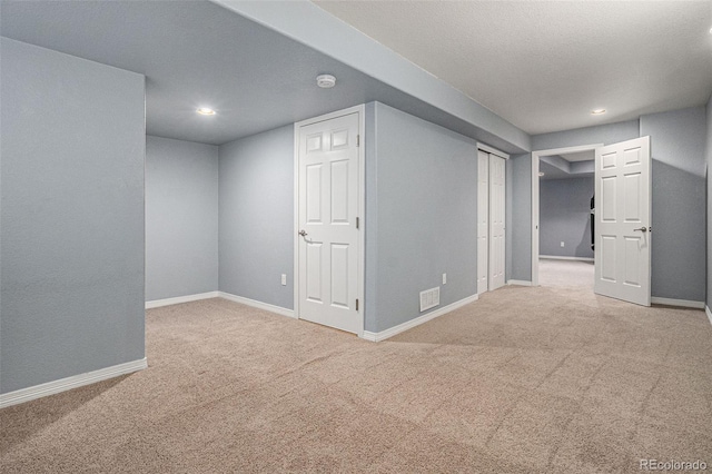 3389 Willowrun Dr, Castle Rock, CO 80109 - finished basement with carpet floors, baseboards, and recessed lighting
