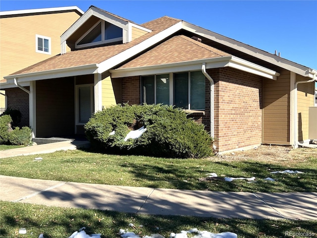 view of home's exterior featuring a yard