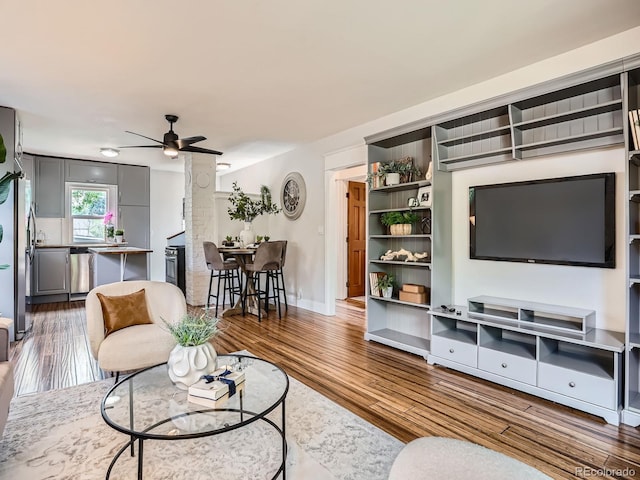 2329 S Gilpin St, Denver, CO 80210 - living area with wood finished floors and a ceiling fan