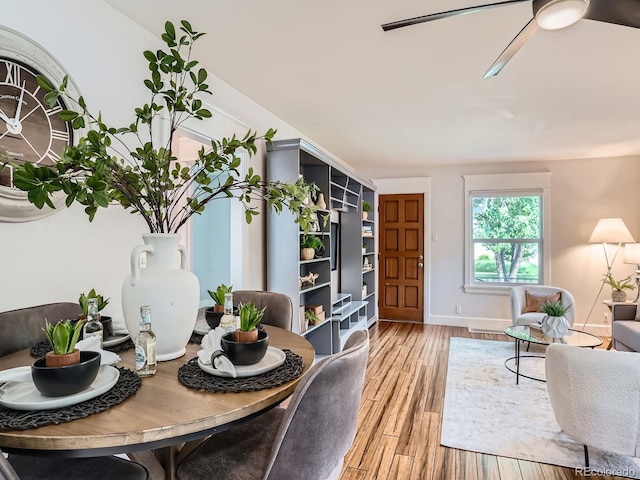 2329 S Gilpin St, Denver, CO 80210 - dining area featuring light wood-style flooring and ceiling fan
