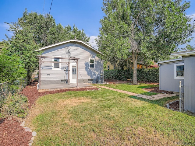 2329 S Gilpin St, Denver, CO 80210 - rear view of property with a patio area
