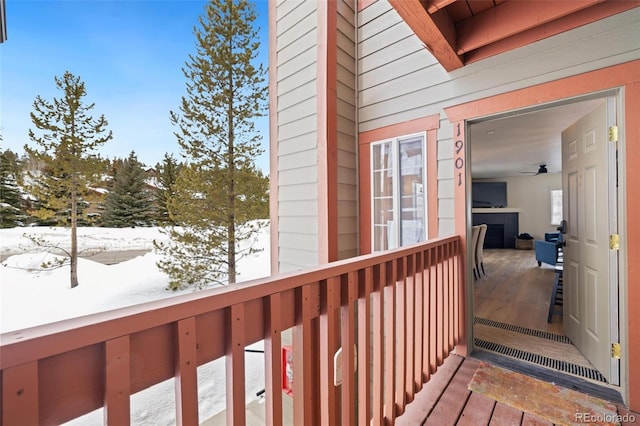 view of snow covered deck