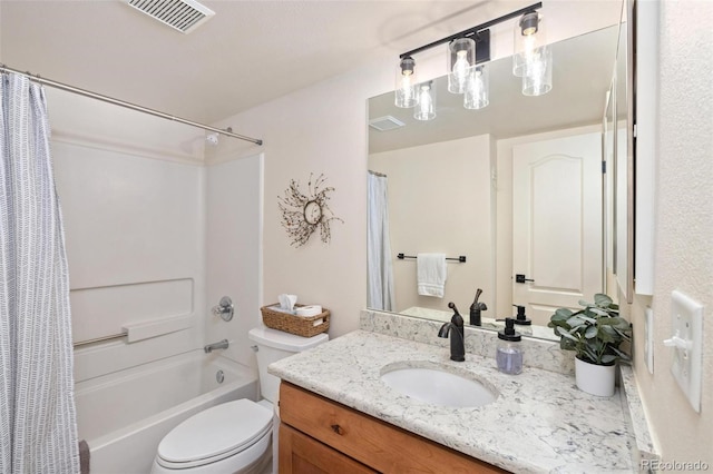 bathroom featuring shower / bath combo, visible vents, vanity, and toilet