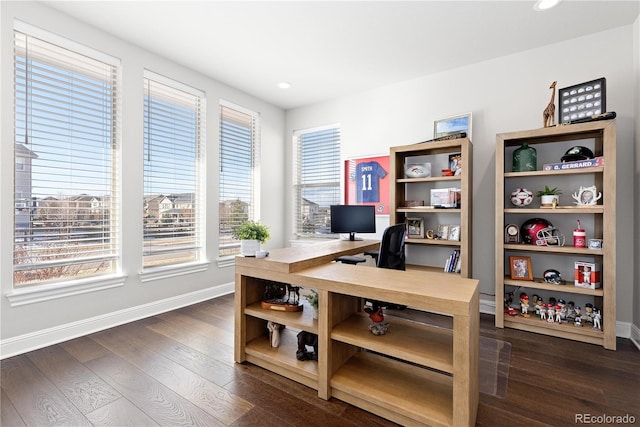 office area featuring recessed lighting, dark wood-type flooring, and baseboards