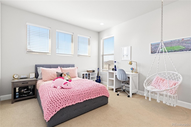 bedroom with baseboards and carpet floors