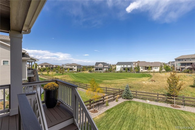 exterior space with a residential view and fence