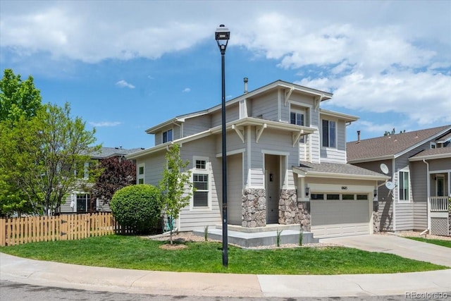 10685 Cherrybrook Cir, Highlands Ranch, CO 80126 - view of front of home featuring driveway, a garage, and stone siding