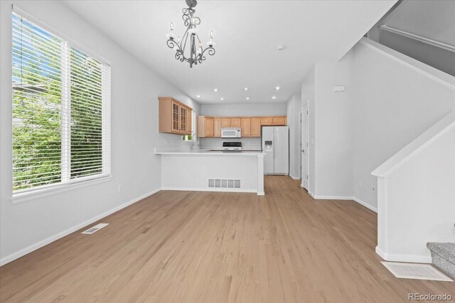 10685 Cherrybrook Cir, Highlands Ranch, CO 80126 - kitchen with white appliances, light wood-style flooring, glass insert cabinets, healthy amount of natural light, and recessed lighting