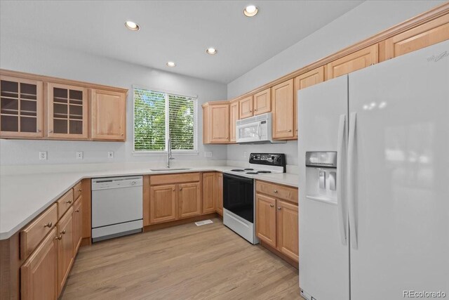 10685 Cherrybrook Cir, Highlands Ranch, CO 80126 - kitchen featuring white appliances, a sink, recessed lighting, light brown cabinetry, and light wood finished floors
