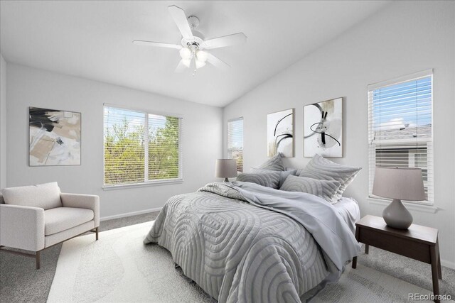 10685 Cherrybrook Cir, Highlands Ranch, CO 80126 - bedroom with light carpet, baseboards, lofted ceiling, and a ceiling fan