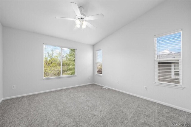10685 Cherrybrook Cir, Highlands Ranch, CO 80126 - carpeted spare room featuring lofted ceiling, baseboards, and a ceiling fan