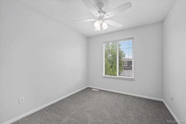 10685 Cherrybrook Cir, Highlands Ranch, CO 80126 - spare room with carpet floors, ceiling fan, and baseboards
