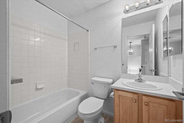 10685 Cherrybrook Cir, Highlands Ranch, CO 80126 - bathroom with vanity, toilet, and  shower combination
