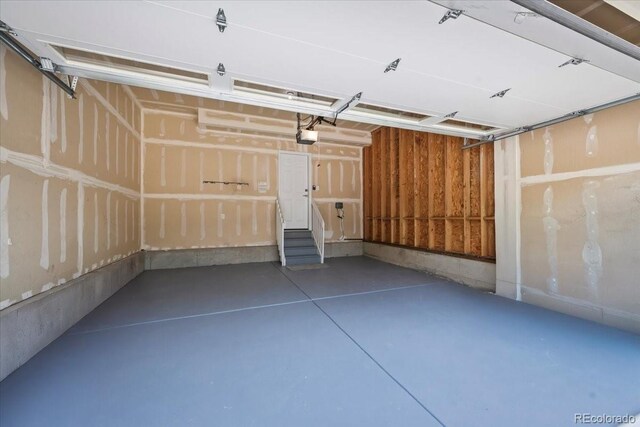 10685 Cherrybrook Cir, Highlands Ranch, CO 80126 - garage featuring a garage door opener