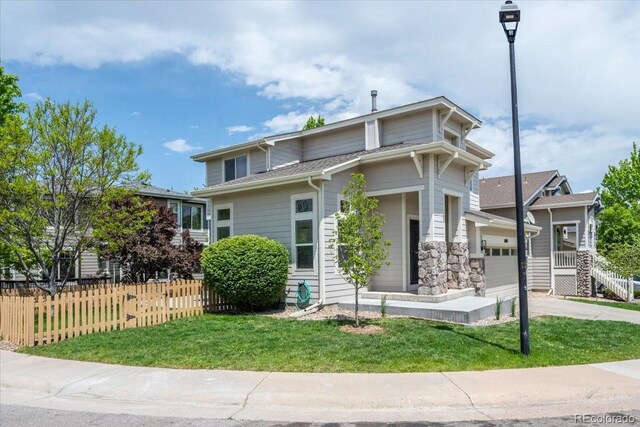 10685 Cherrybrook Cir, Highlands Ranch, CO 80126 - view of front facade with driveway and an attached garage
