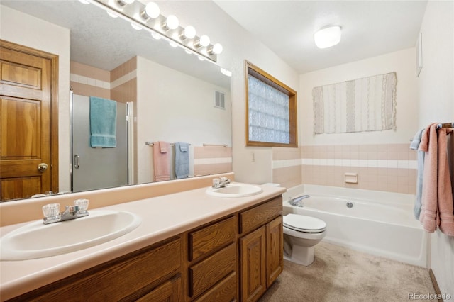 4992 White House Trl, Evergreen, CO 80439 - full bath featuring a shower stall, double vanity, a garden tub, and toilet