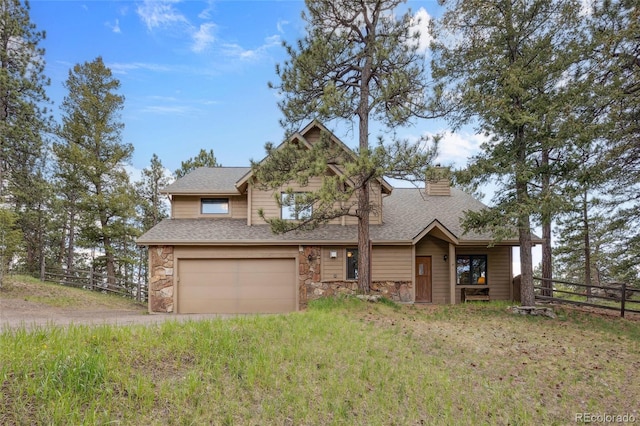 4992 White House Trl, Evergreen, CO 80439 - view of front of property with stone siding, a chimney, dirt driveway, an attached garage, and a shingled roof