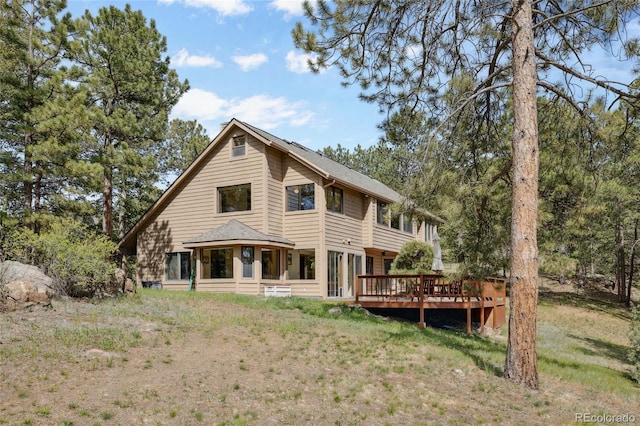 4992 White House Trl, Evergreen, CO 80439 - back of property with a wooden deck
