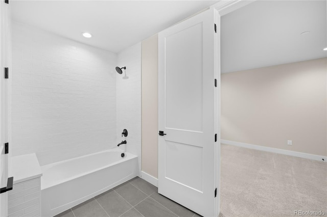 bathroom with baseboards, recessed lighting, bathing tub / shower combination, and tile patterned floors