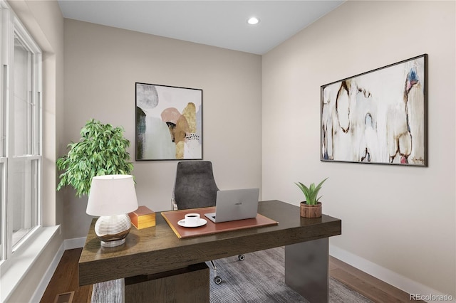 home office with recessed lighting, visible vents, baseboards, and wood finished floors