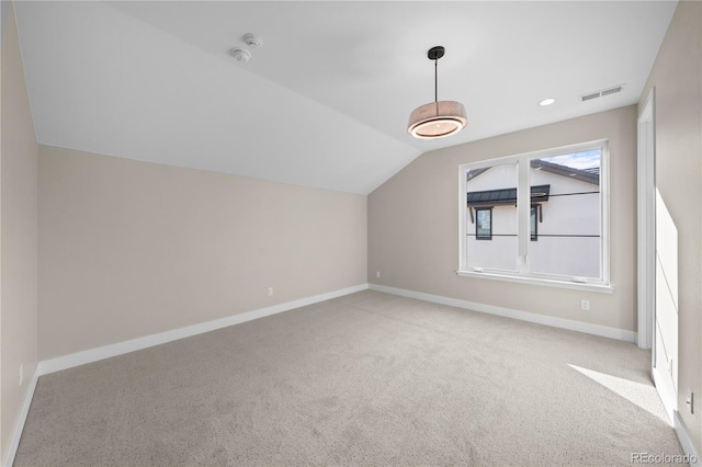 bonus room with recessed lighting, light colored carpet, visible vents, baseboards, and vaulted ceiling