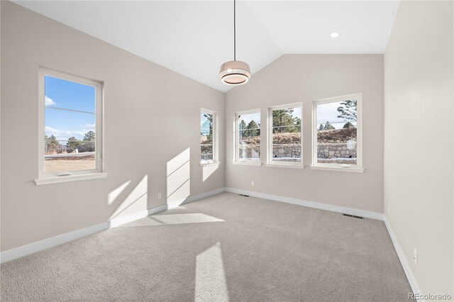 8014 Trinity Peak Ln, Castle Rock, CO 80108 - empty room featuring light colored carpet, baseboards, and lofted ceiling