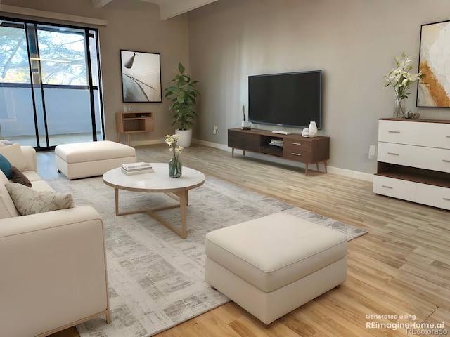 living area with light wood-style floors and baseboards