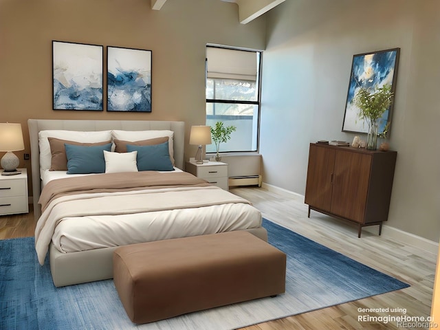 bedroom featuring a baseboard radiator, baseboards, and light wood finished floors