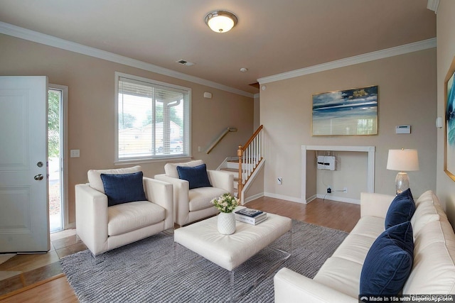 3515 W Walsh Pl, Denver, CO 80219 - living area with stairway, wood finished floors, crown molding, and baseboards