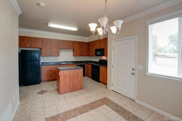 3515 W Walsh Pl, Denver, CO 80219 - kitchen with black appliances, dark countertops, a chandelier, light tile patterned flooring, and a kitchen island