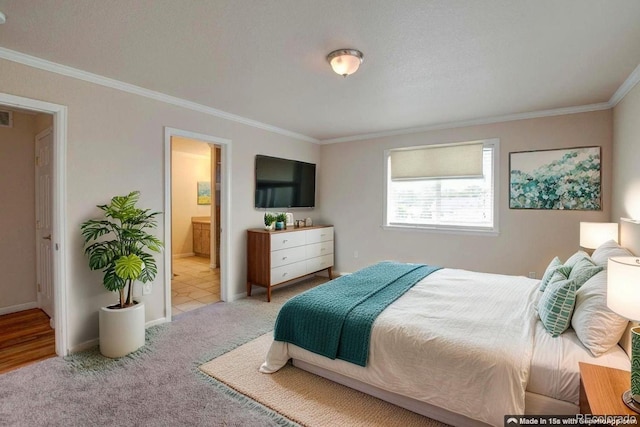 3515 W Walsh Pl, Denver, CO 80219 - bedroom featuring crown molding, carpet, baseboards, and connected bathroom