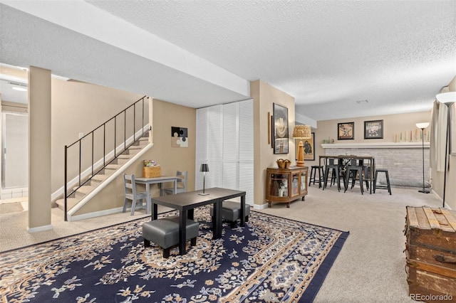 1204 Catalpa Cir, Broomfield, CO 80020 - living room featuring carpet flooring, a textured ceiling, and stairway