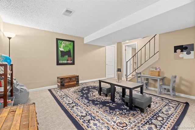 1204 Catalpa Cir, Broomfield, CO 80020 - living area with carpet floors, a textured ceiling, and stairs
