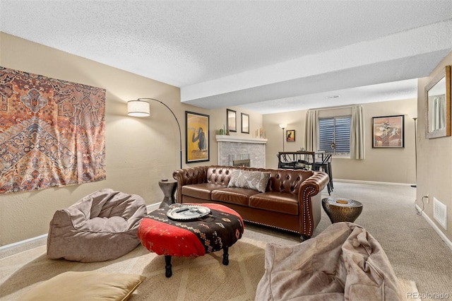 1204 Catalpa Cir, Broomfield, CO 80020 - carpeted living area featuring a textured ceiling and a warm lit fireplace