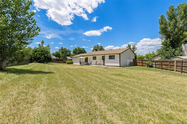 1204 Catalpa Cir, Broomfield, CO 80020 - back of house featuring a fenced backyard