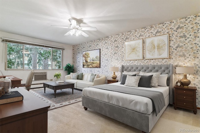 bedroom featuring light carpet and ceiling fan